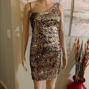 Gorgeous gold shoulder mini dress.